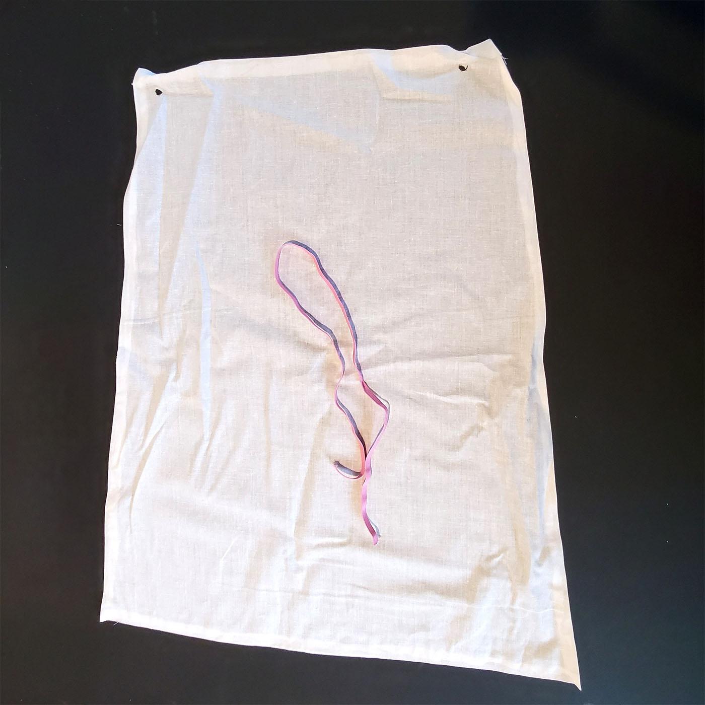 A piece of muslin fabric designed to be made into a cape