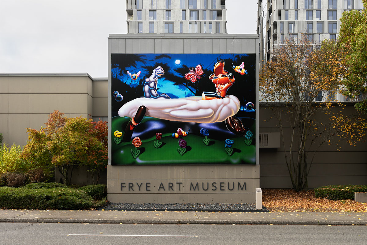 A large printed banner of a surreal artwork on the exterior of a building above metal letters reading 'Frye Art Museum'