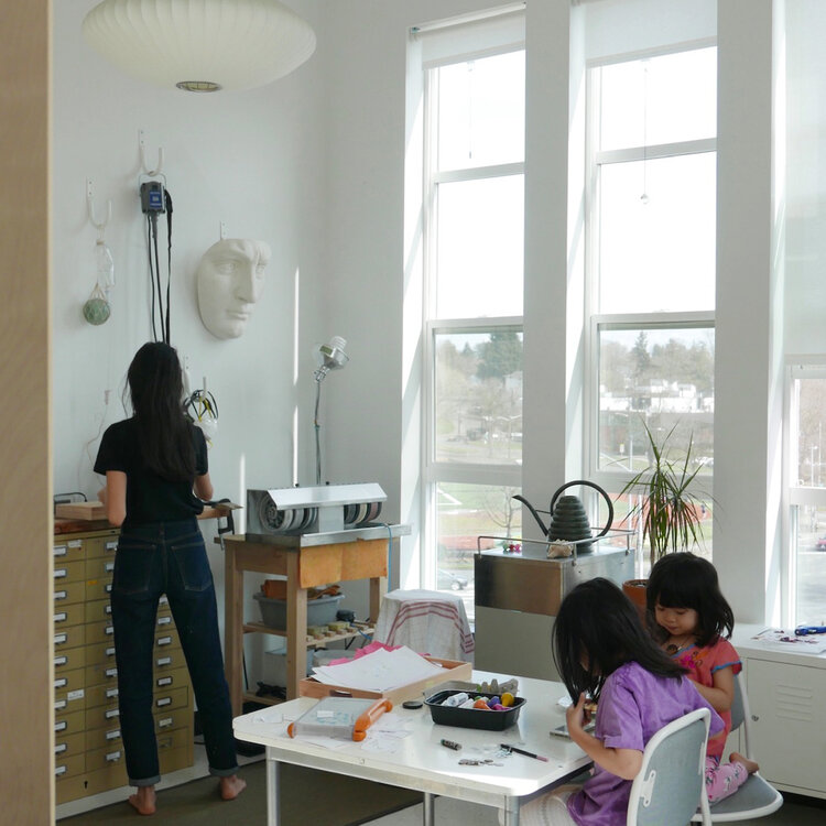 Shanya Estaban (@morningritualstudio) with children in her Seattle-based studio.
