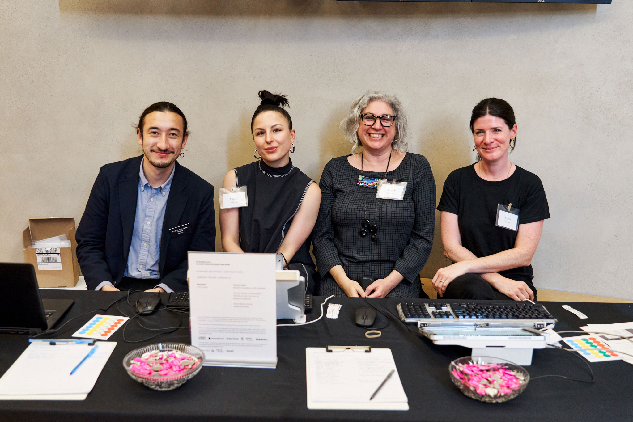 Photo of four people sitting at a table