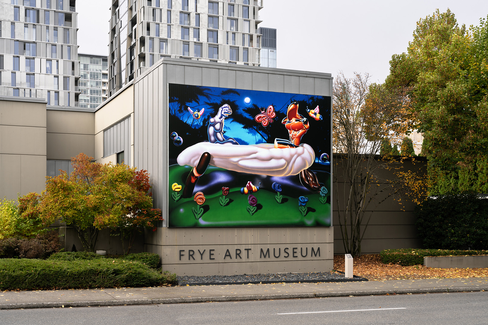 A large, colorful artwork on the side of a building