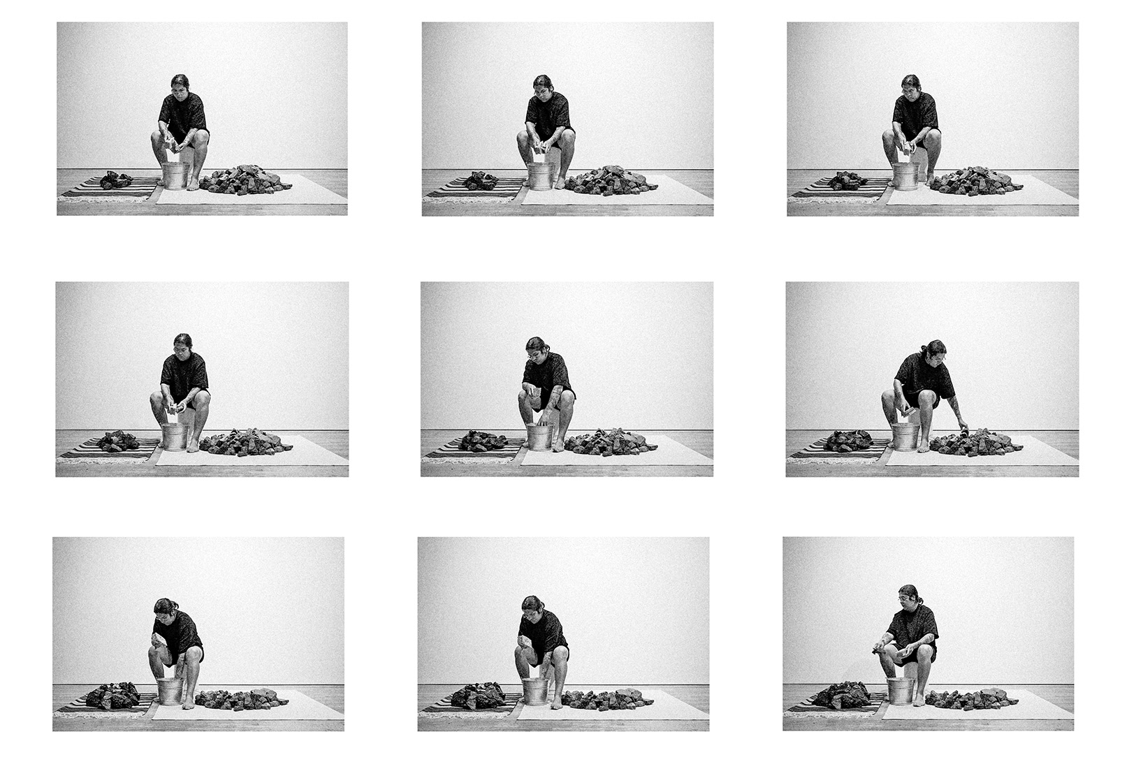 A series of black and white photos of a person sitting behind a bucket next to piles of rocks