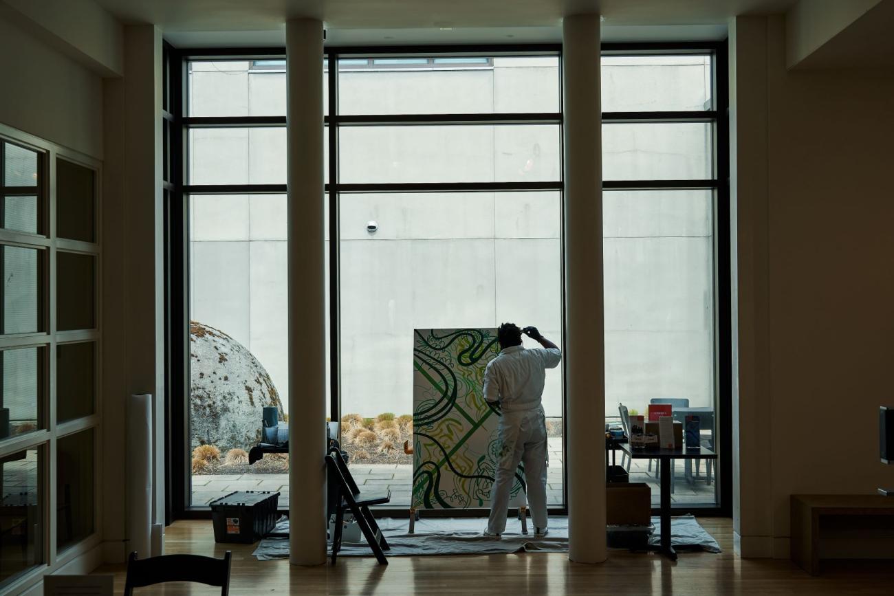Moses Sun live painting during the Museum’s Community Day. Photo: Jonathan Vanderweit