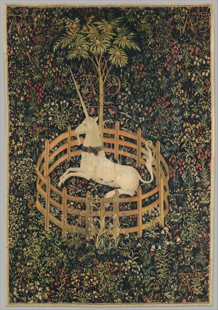Image of a tapestry that shows a white unicorn sitting inside a circular fence, beside a tree, surrounded by foliage