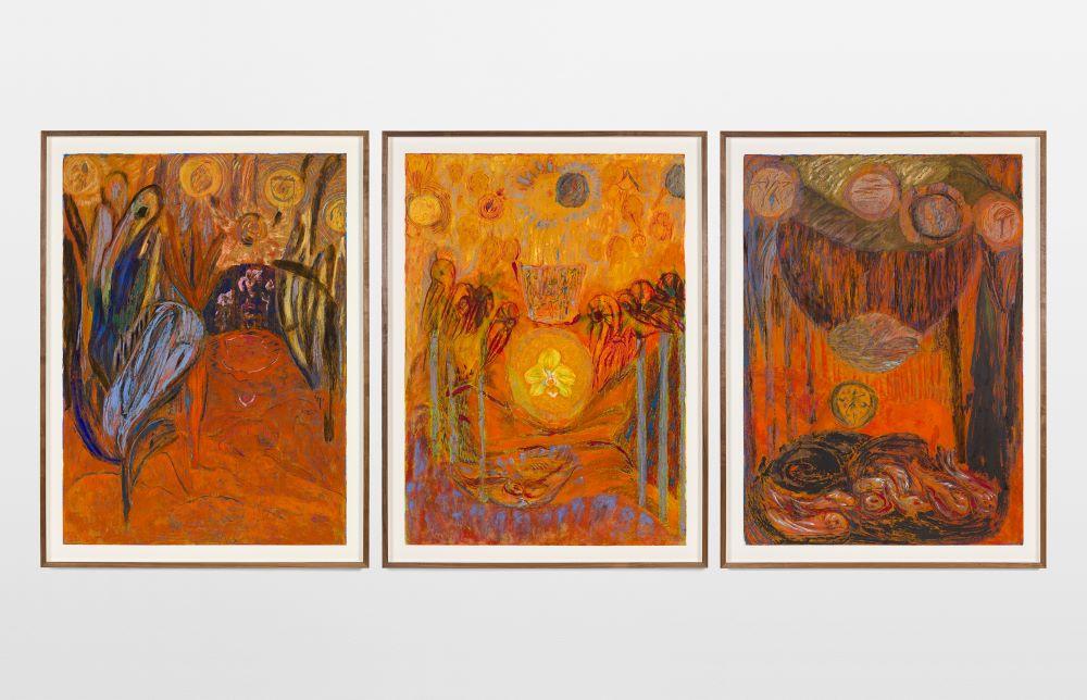 Three panels of a framed abstracted painting with oranges, yellows, reds and other hues.