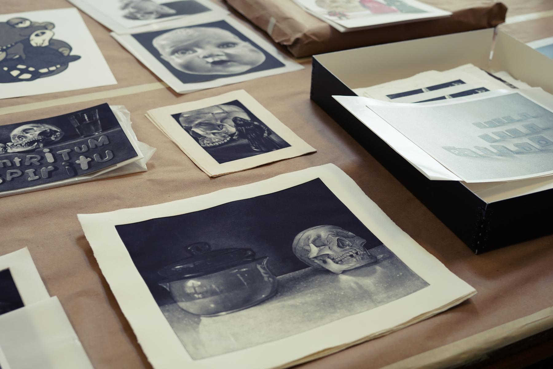 Photo of vanitas still lifes by Ben Moreau laid out on a table