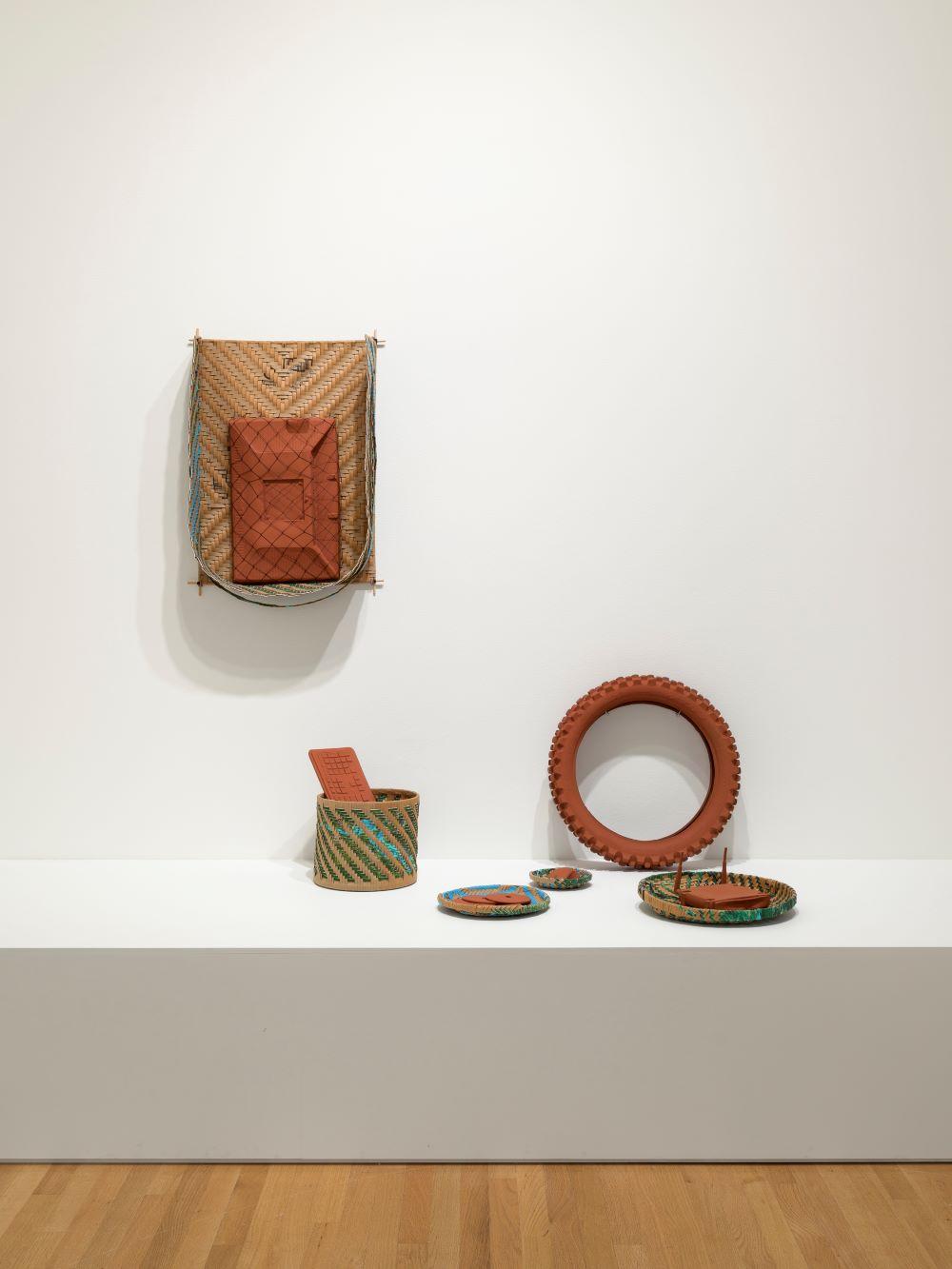 Installation of woven objects and terra cotta objects