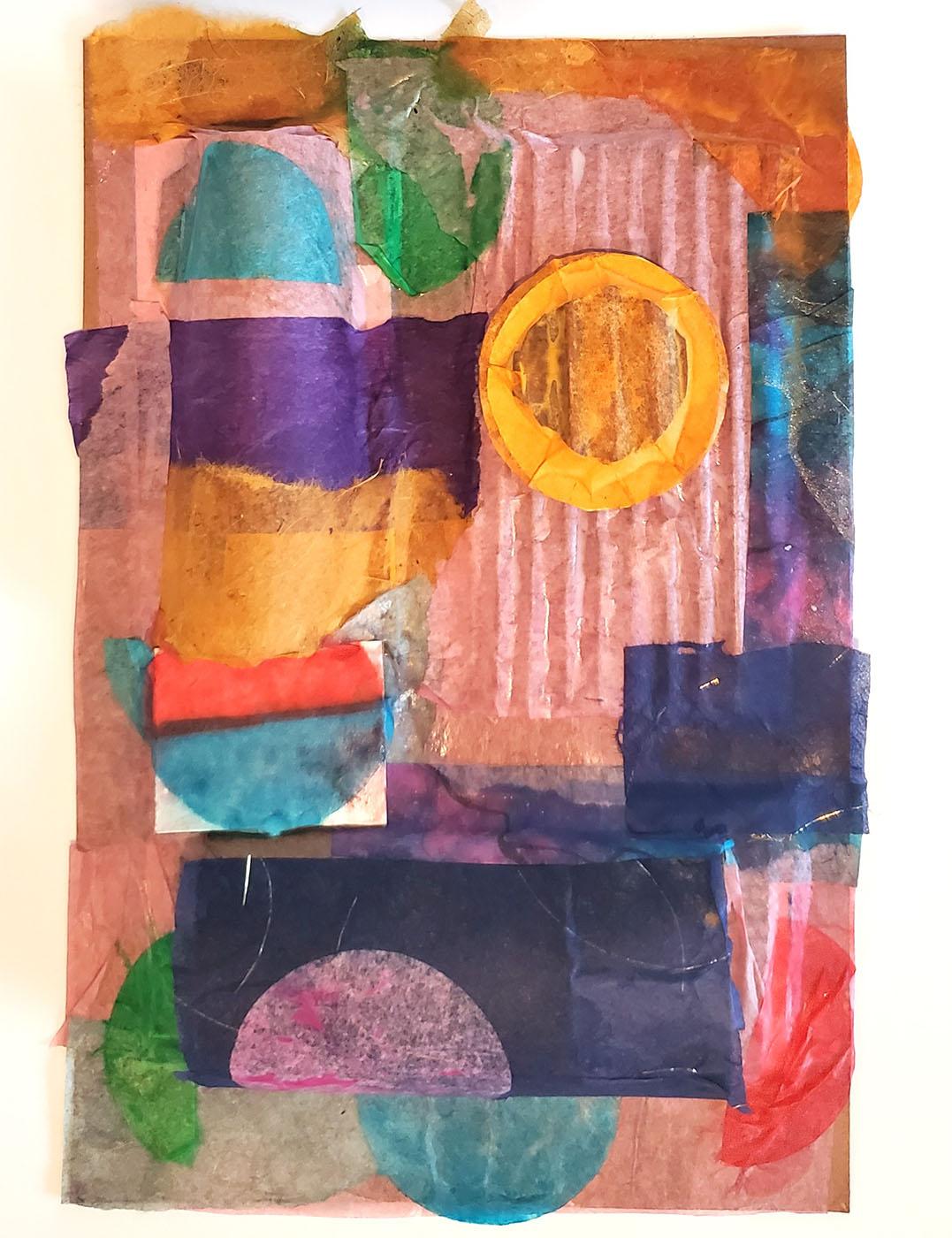 Colorful paper and tissues glued onto a cardboard assemblage