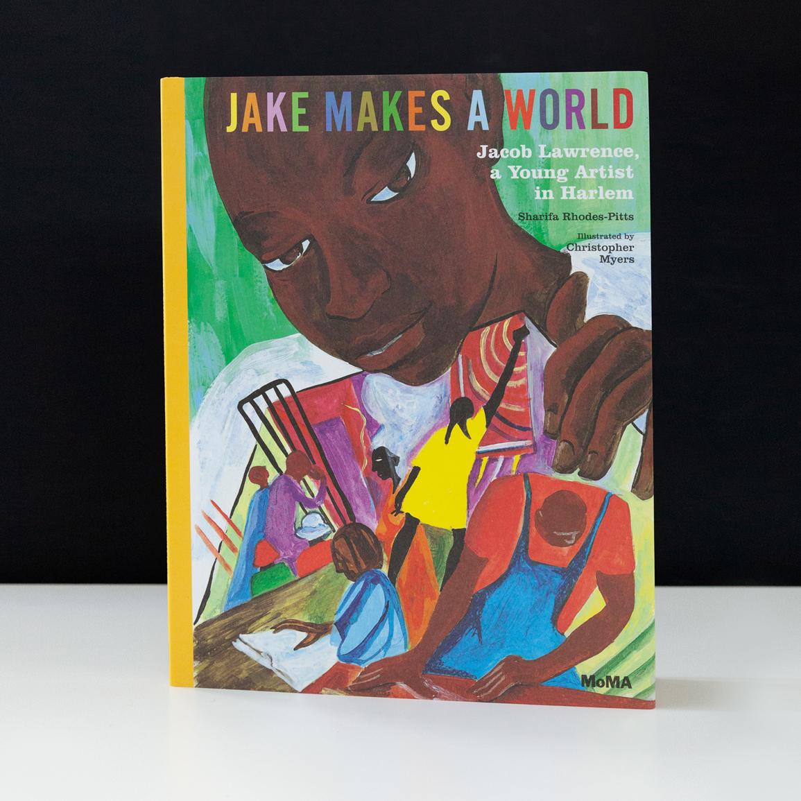 Cover of "Jake Makes A World" with the title and a painting of a Black child holding up a picture with bright figures and scenes on it